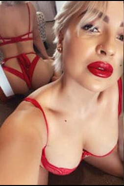 sexy little blonde female stripper in revealing red lingerie in robina on the gold coast