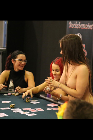 Topless Female Poker Dealer Shuffling Cards female topless poker dealer working at a bachelor party